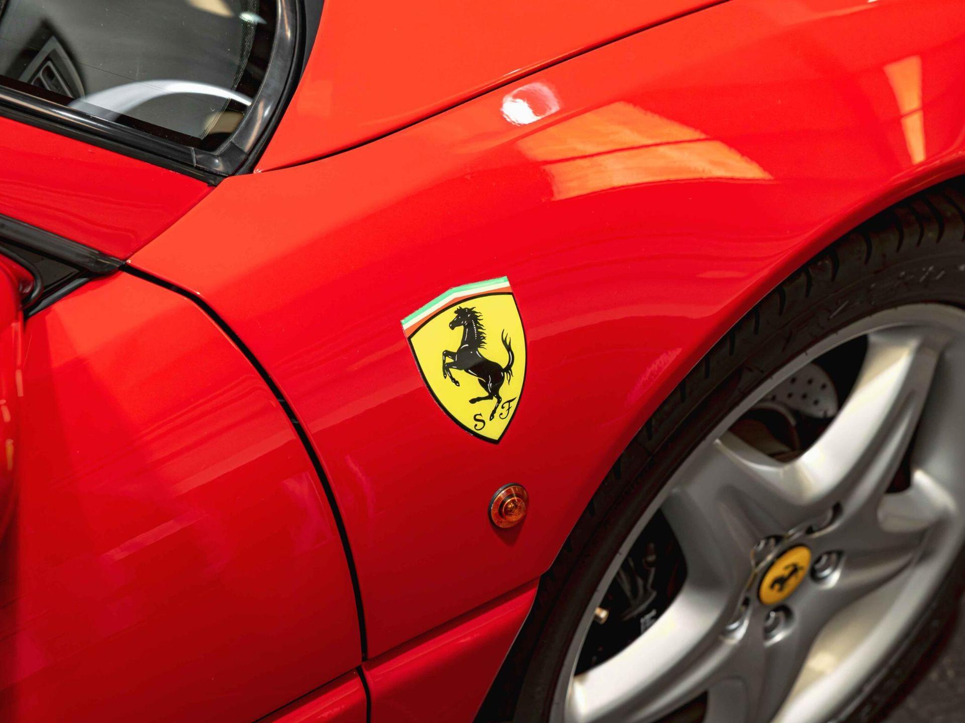 An exterior shot of the badge exterior on a 1997 Ferrari F355