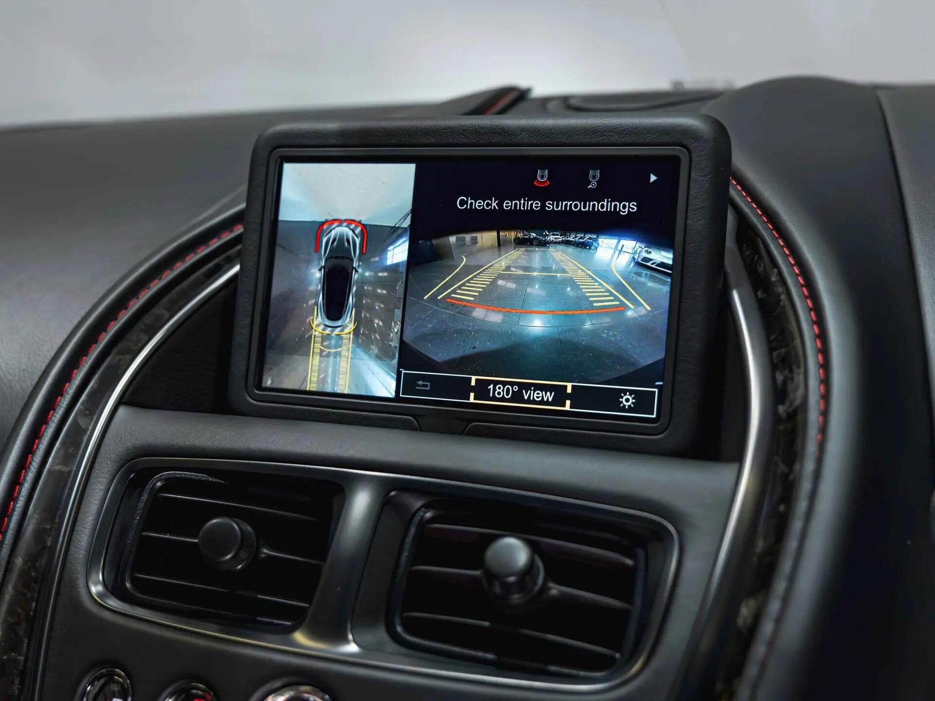 An interior shot of the infotainment system on a 2019 Aston Martin DBS