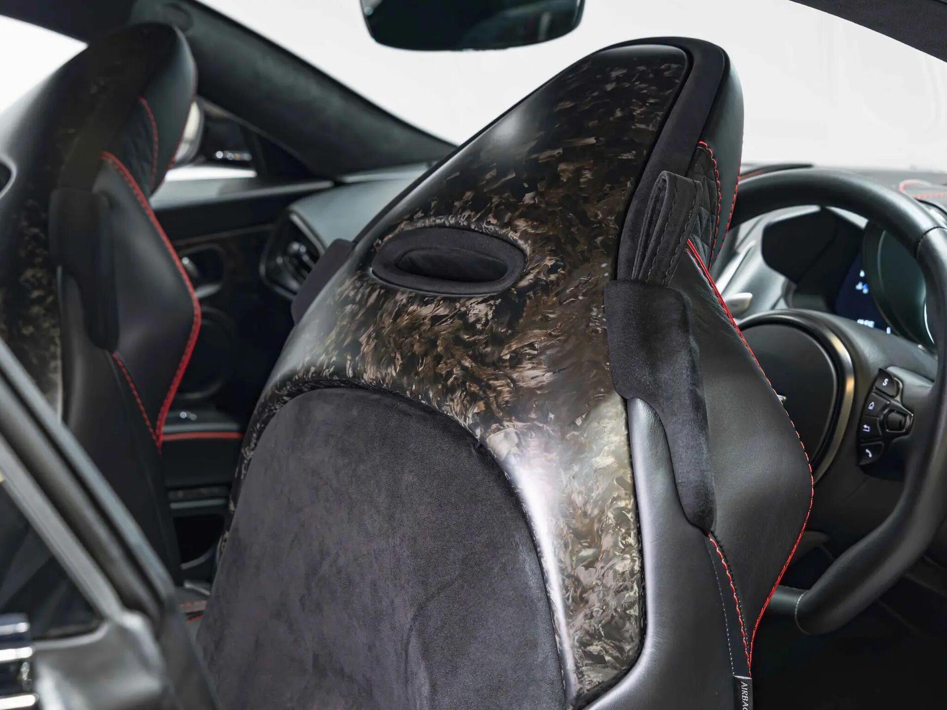 An interior shot of the driver seat on a 2019 Aston Martin DBS