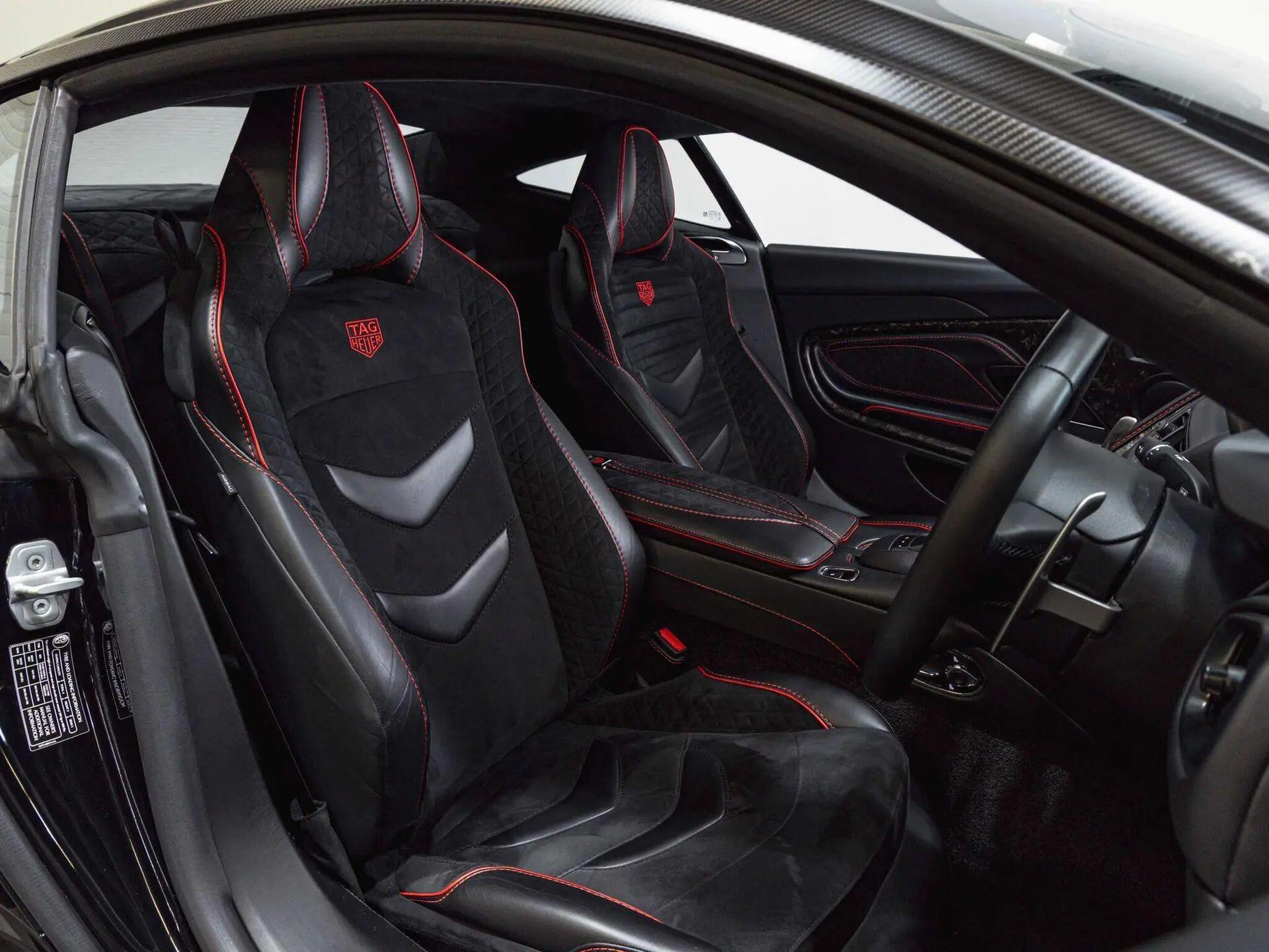 An interior shot of the driver seat on a 2019 Aston Martin DBS