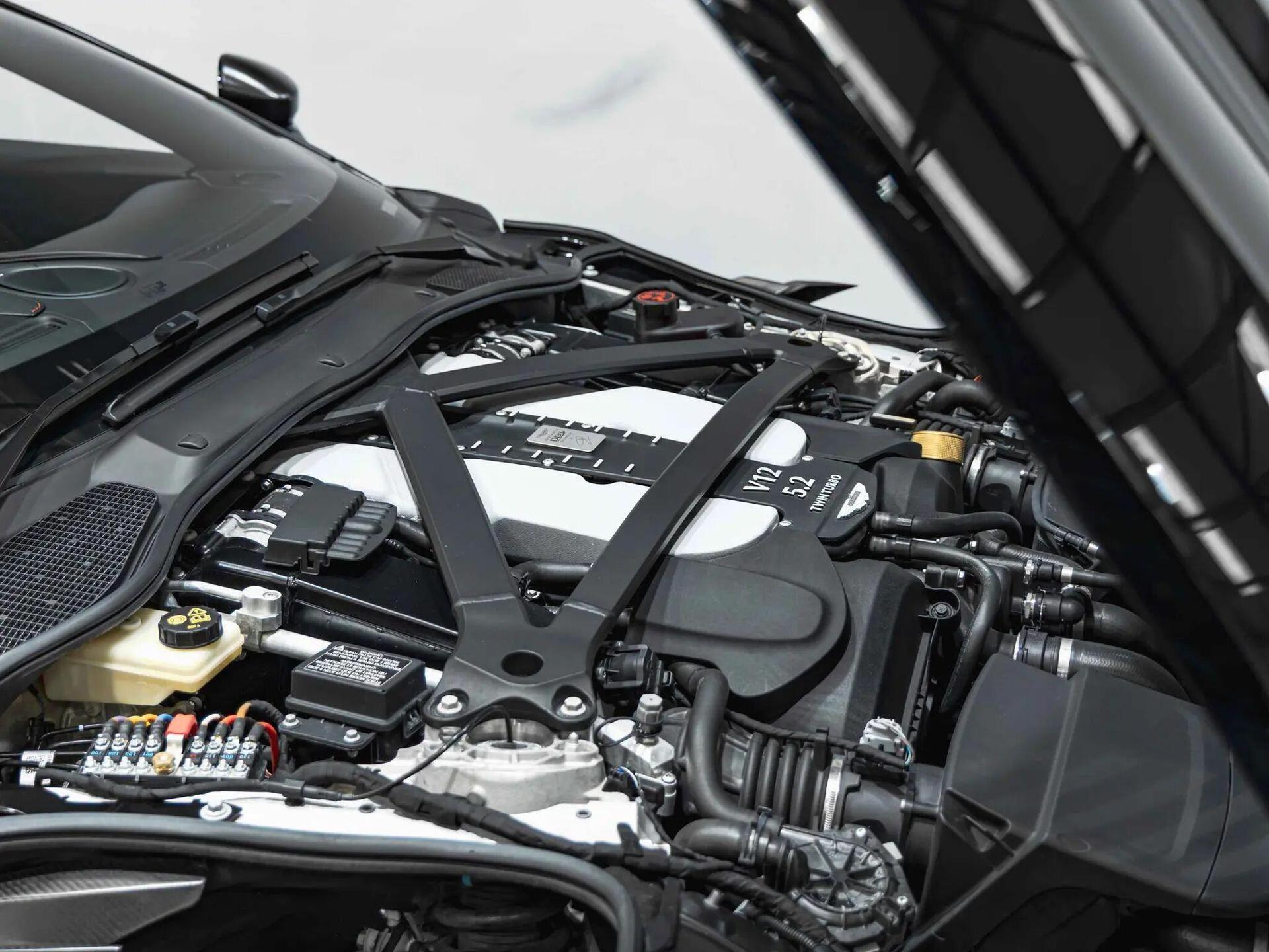 An exterior shot of the engine on a 2019 Aston Martin DBS