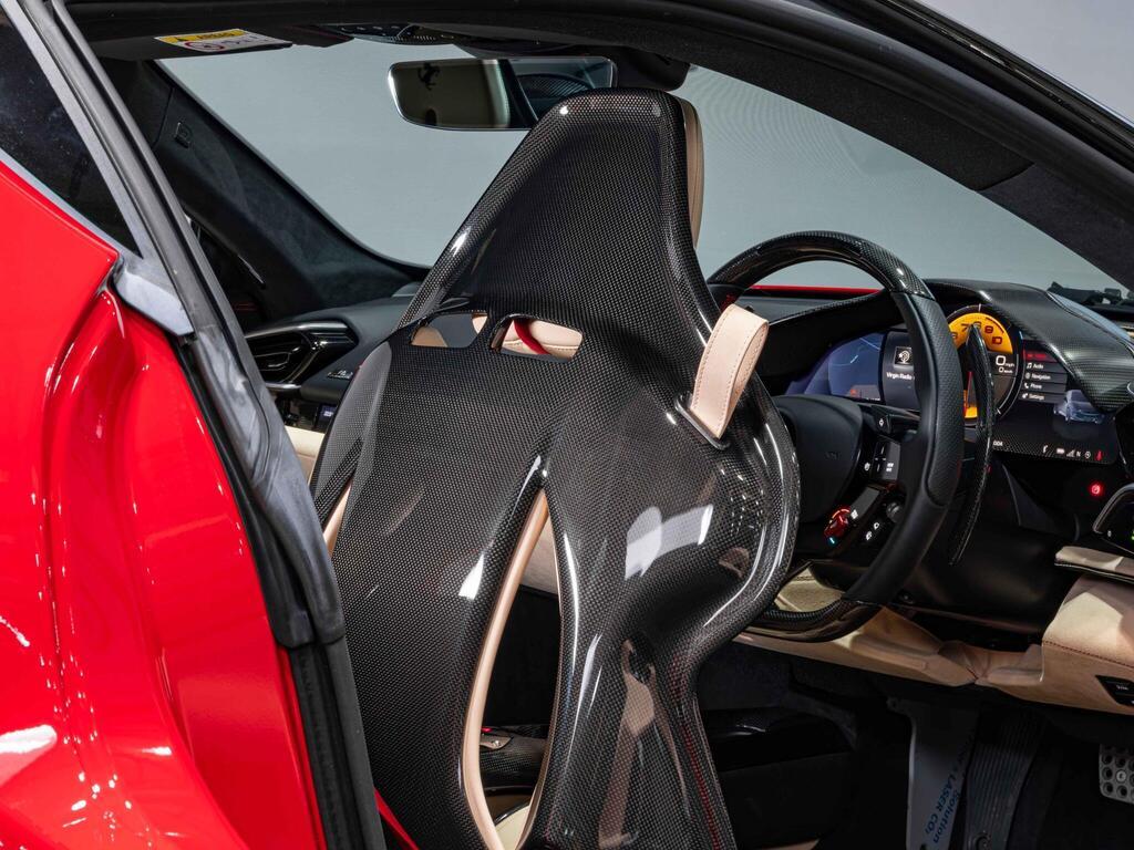 An interior shot of the driver seat on a 2022 Ferrari 296 GTB