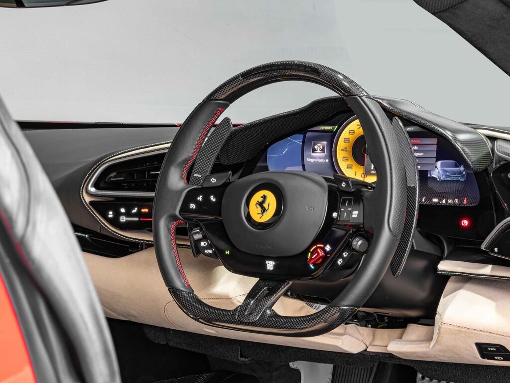 An interior shot of the steering wheel on a 2022 Ferrari 296 GTB