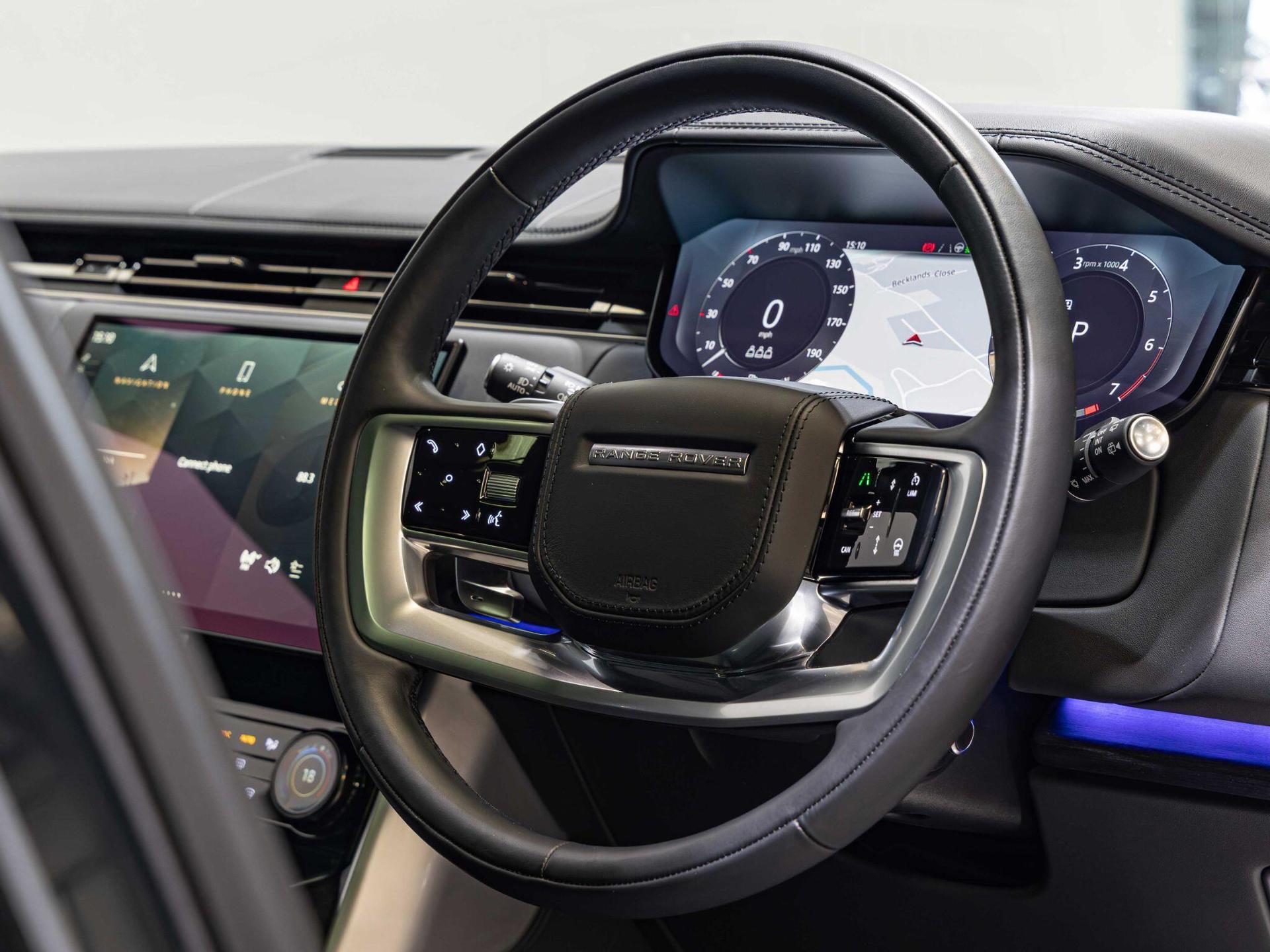 An interior shot of the steering wheel on a 2023 Land Rover RANGE ROVER