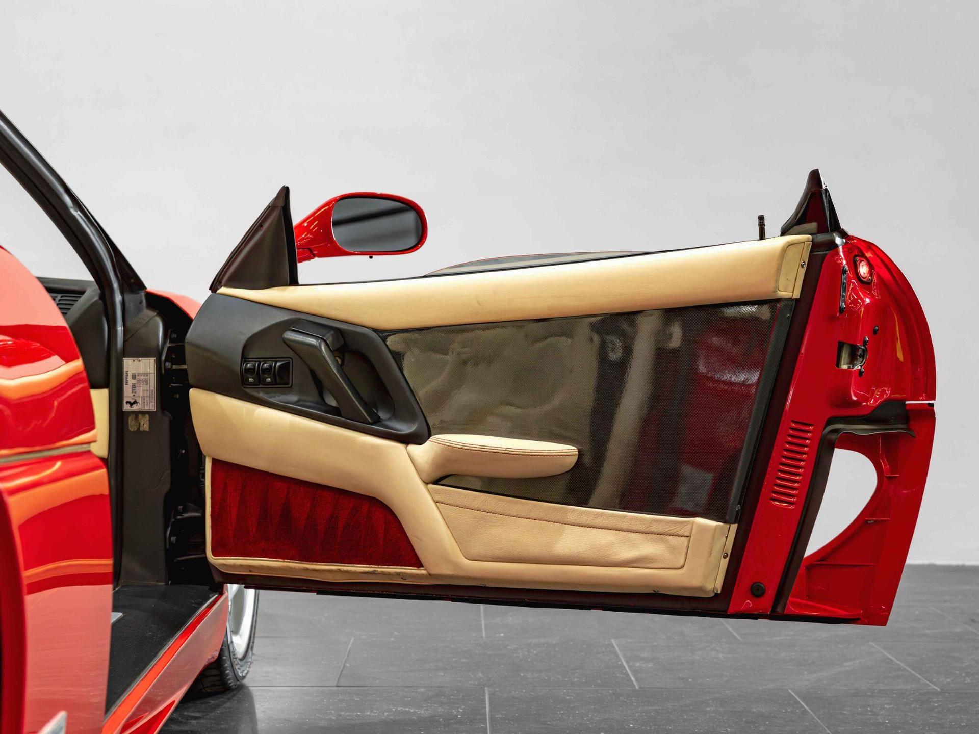 An interior shot of the door interior on a 1997 Ferrari F355