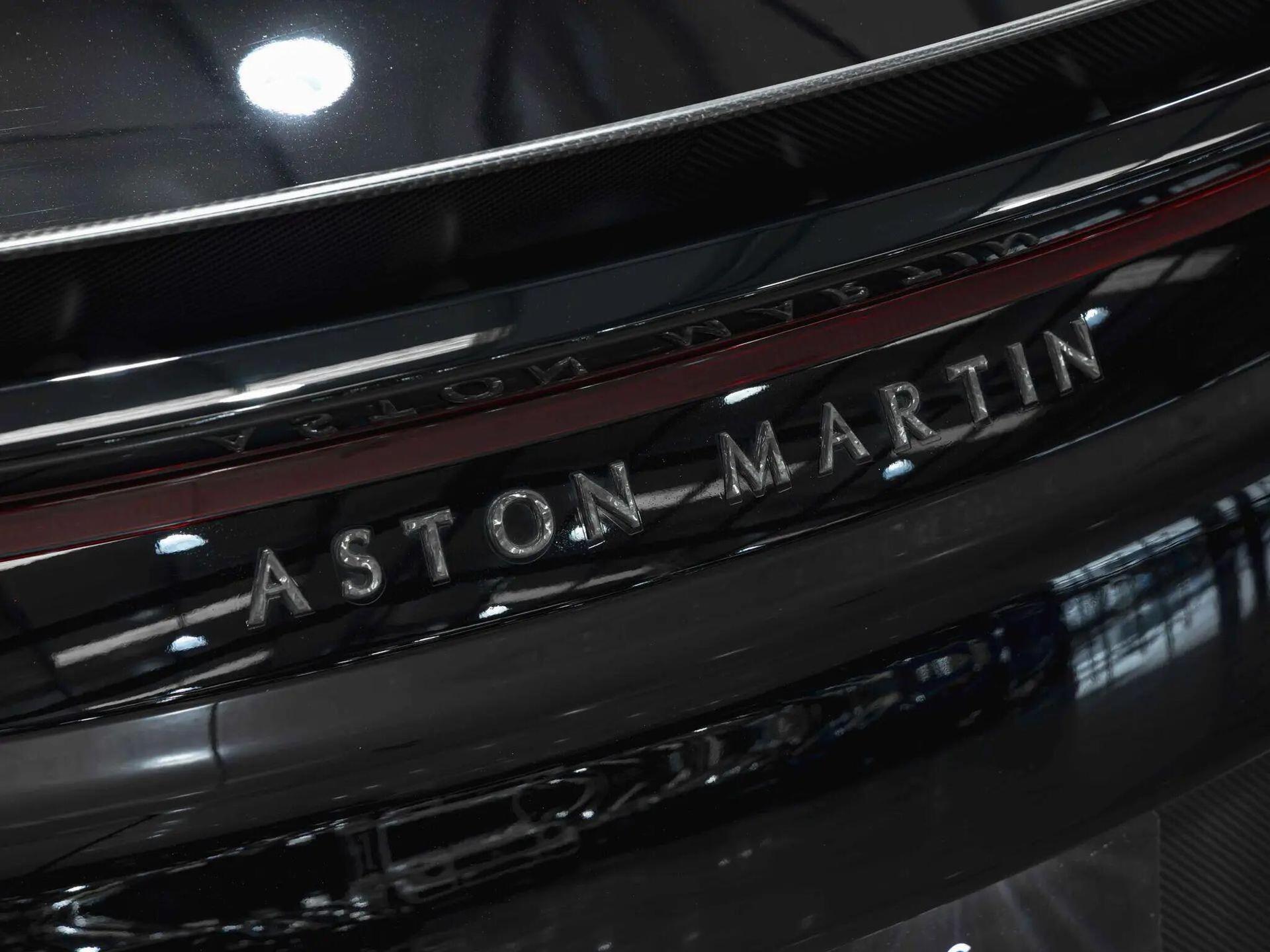 An exterior shot of the badge exterior on a 2019 Aston Martin DBS