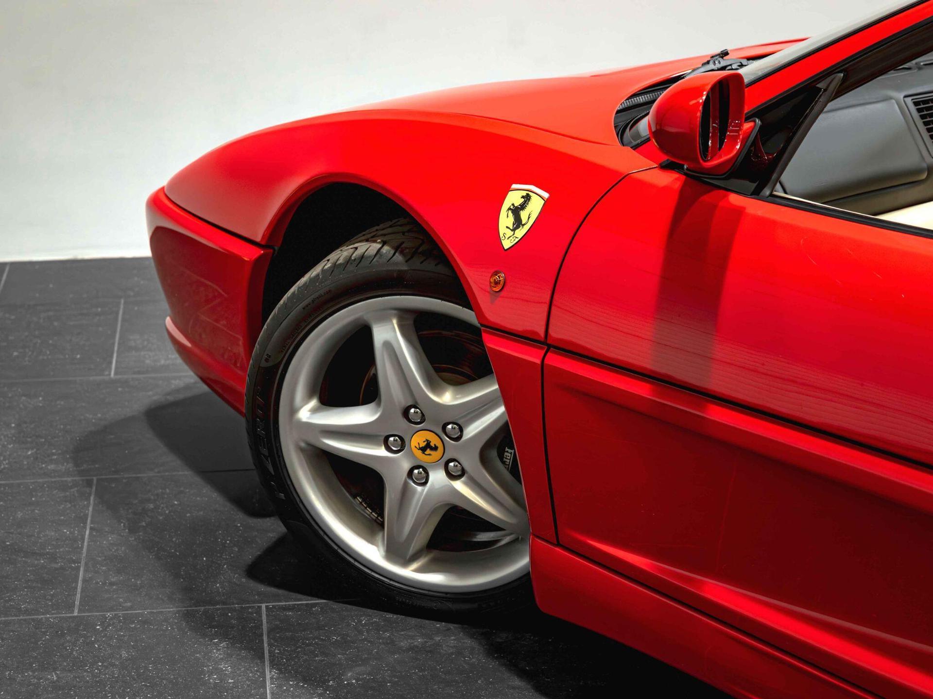 An exterior shot of the wheel on a 1997 Ferrari F355