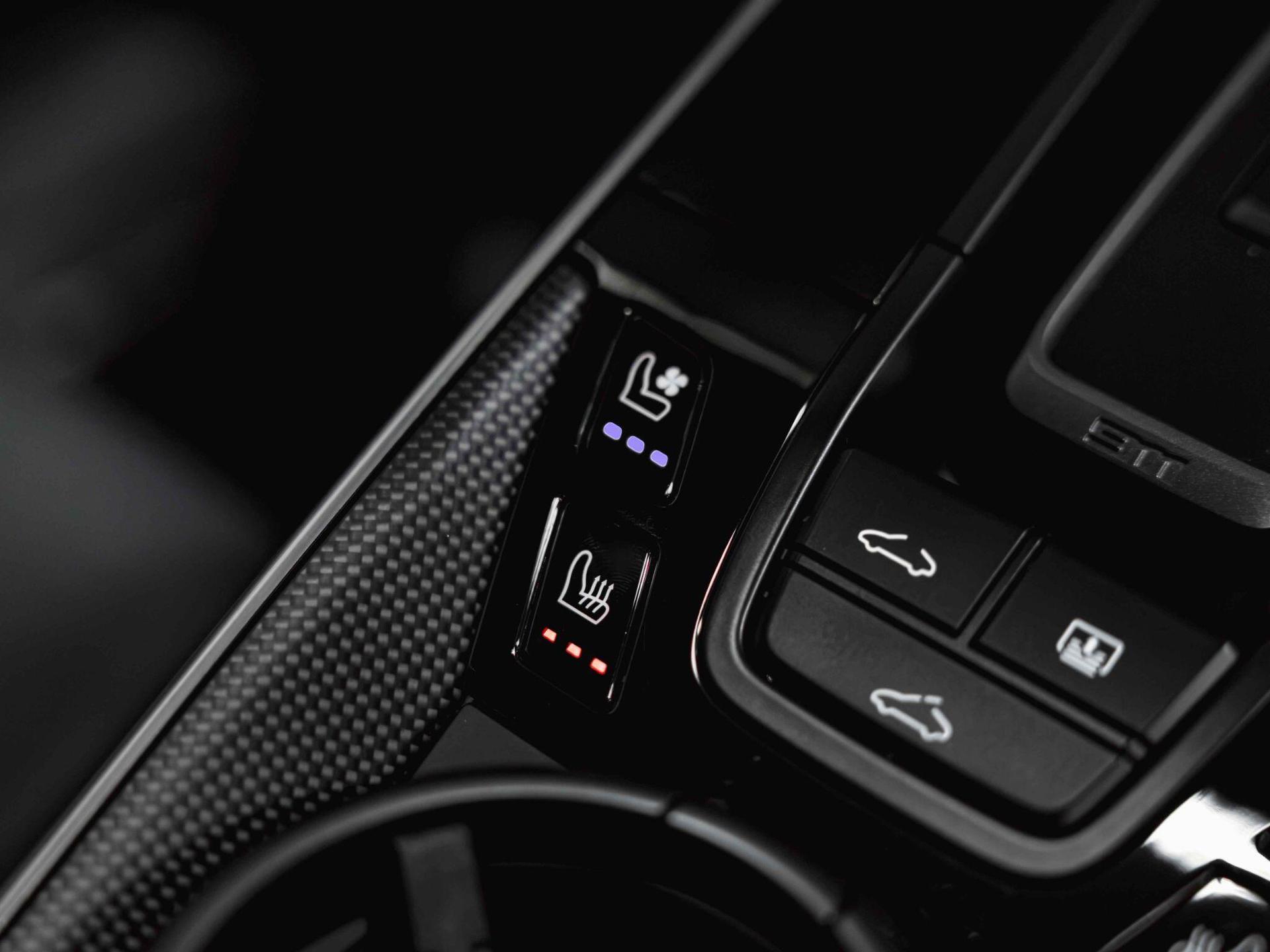 An interior shot of the misc controls on a 2023 Porsche 911
