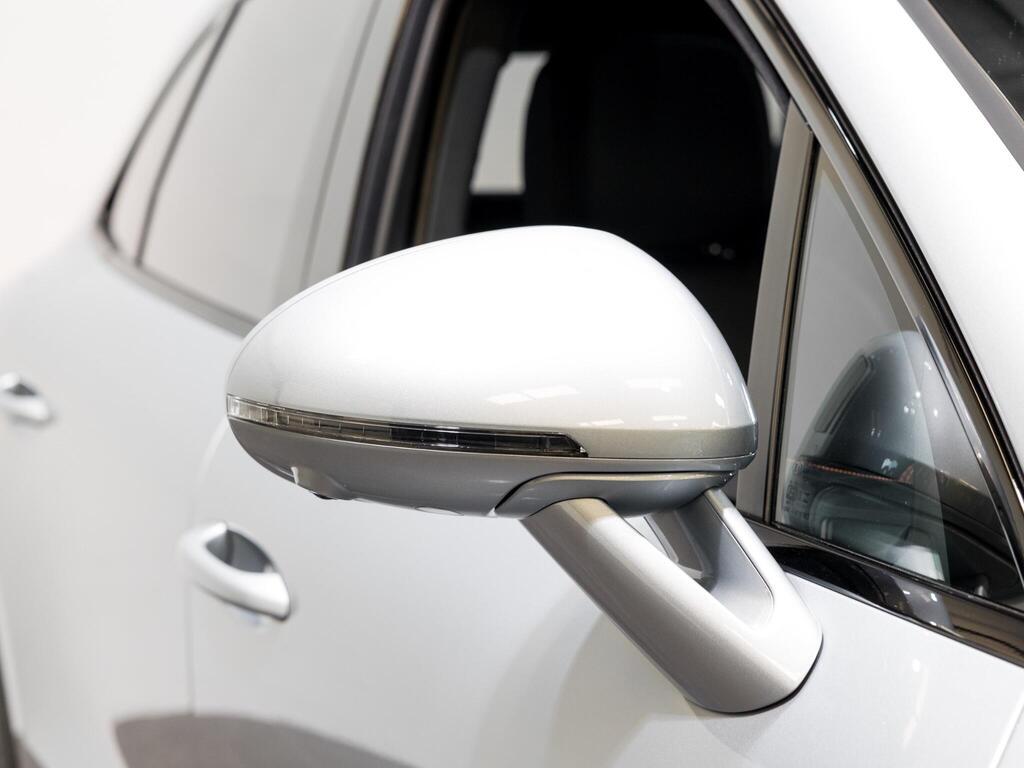 An exterior shot of the wing mirror on a 2025 Porsche Macan