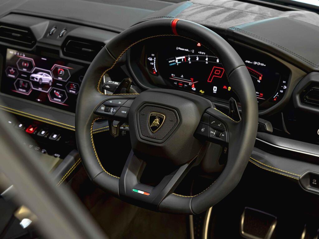 An interior shot of the steering wheel on a 2025 Lamborghini Urus