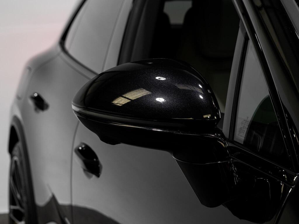 An exterior shot of the wing mirror on a 2025 Porsche Macan