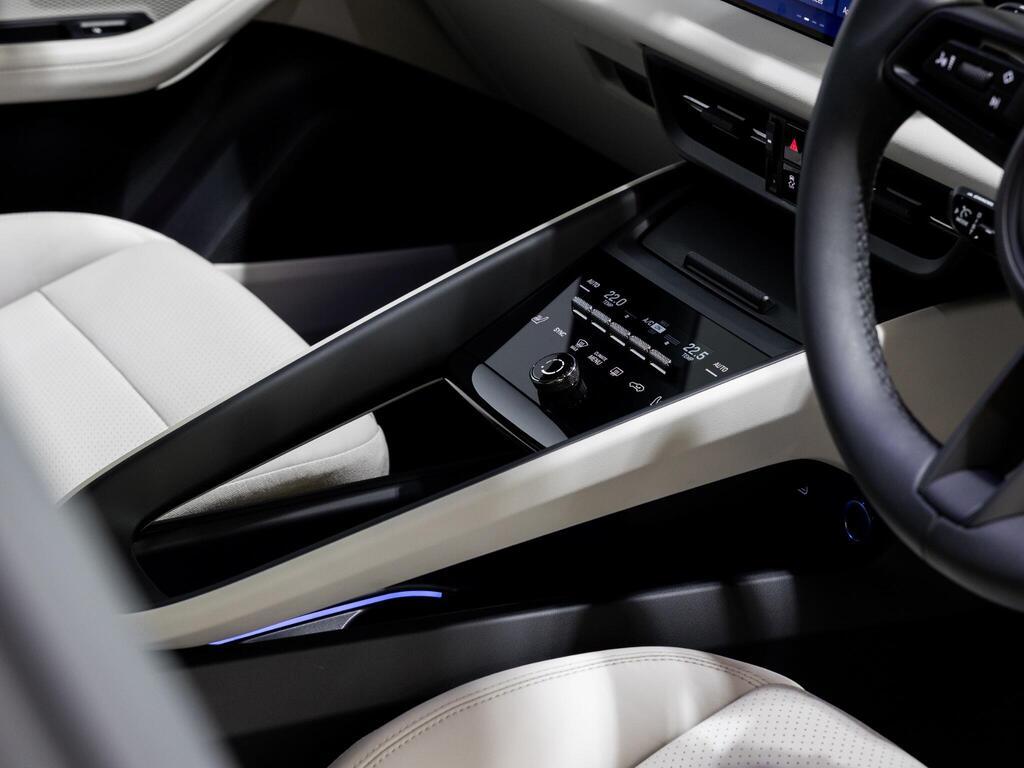 An interior shot of the steering wheel on a 2025 Porsche Macan