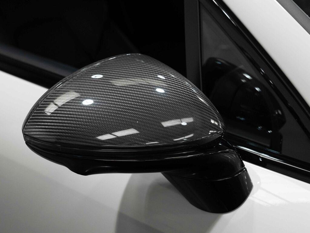 An exterior shot of the wing mirror on a 2024 Porsche Cayenne