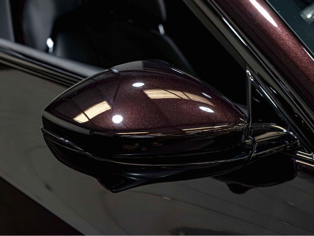 An exterior shot of the wing mirror on a 2024 Ferrari Purosangue