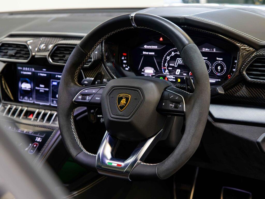 An interior shot of the steering wheel on a 2022 Lamborghini Urus