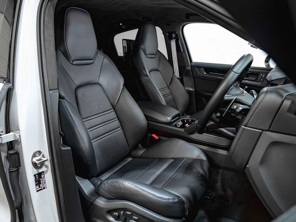 An interior shot of the driver seat on a 2024 Porsche Cayenne