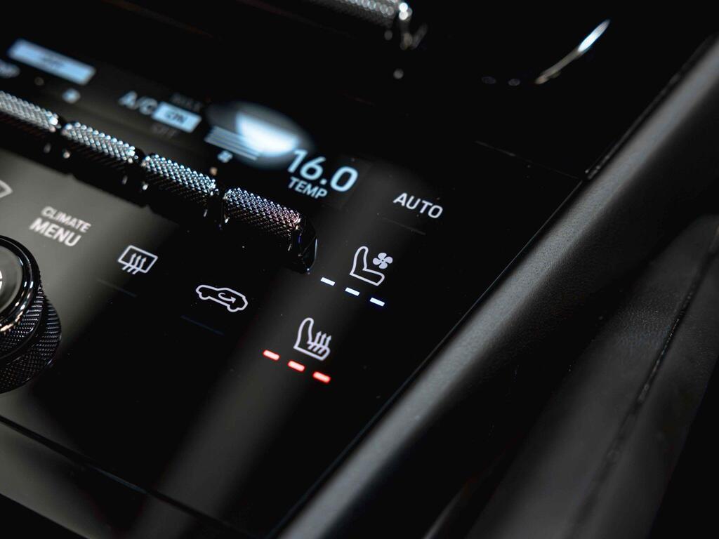 An interior shot of the misc controls on a 2024 Porsche Cayenne