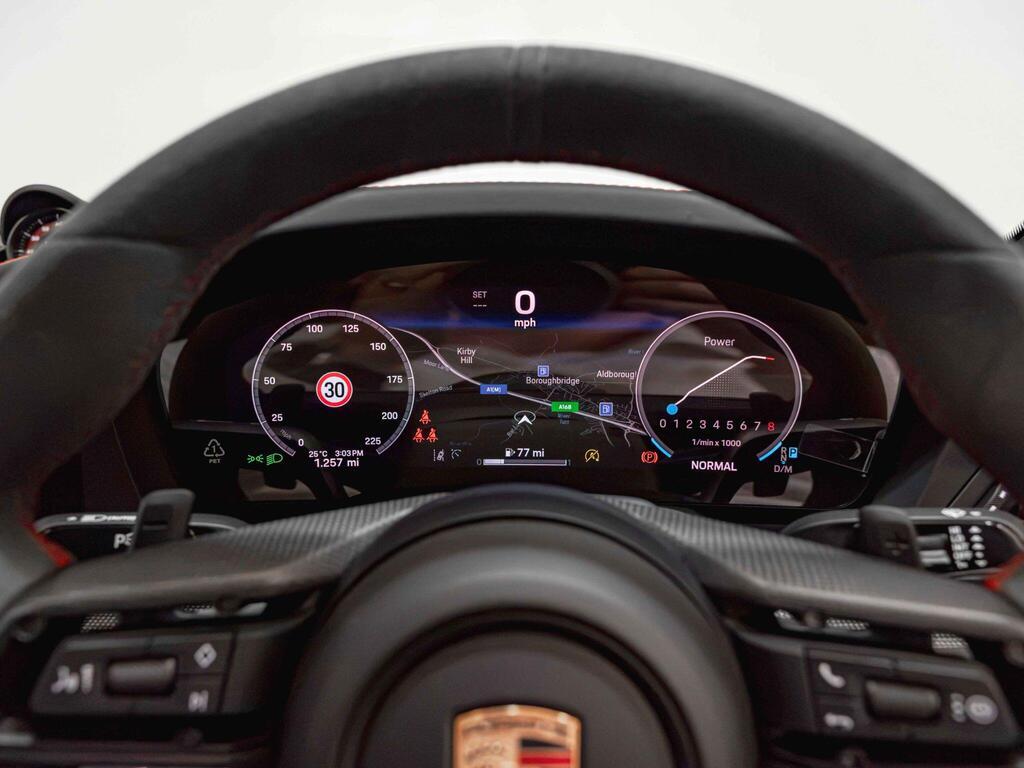 An interior shot of the driver instruments on a 2026 Porsche 911