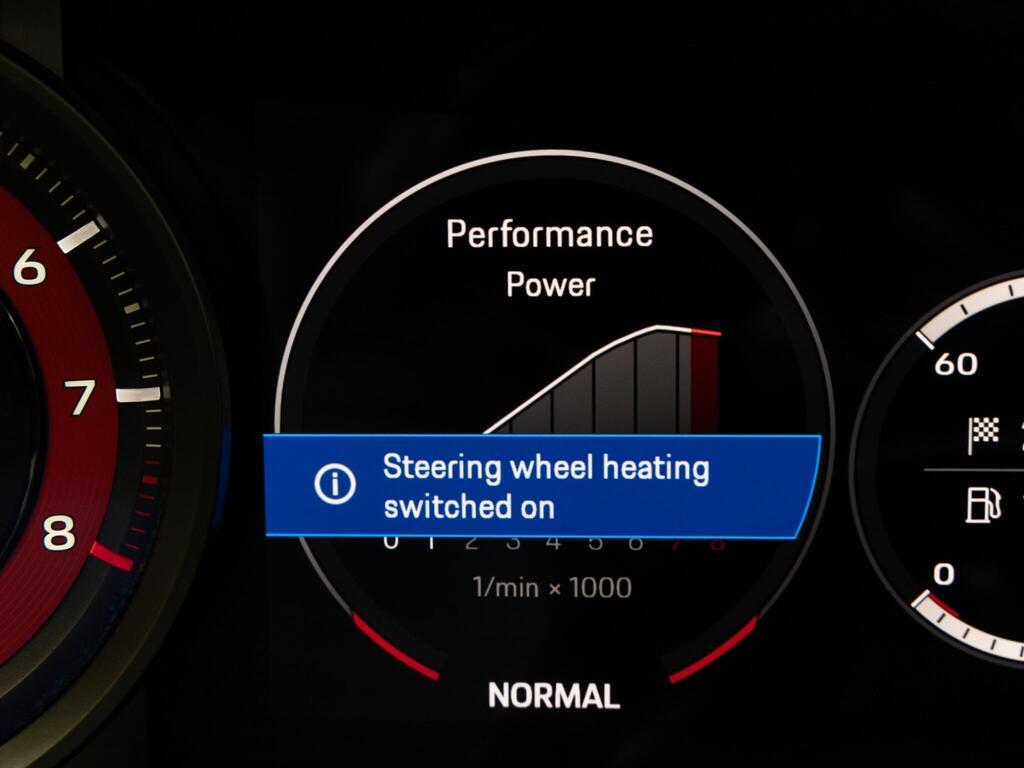 An interior shot of the driver instruments on a 2023 Porsche 911