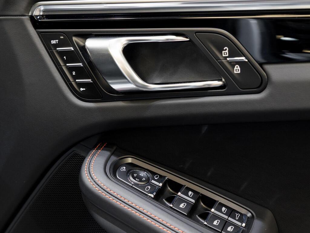 An interior shot of the misc controls on a 2025 Porsche Macan