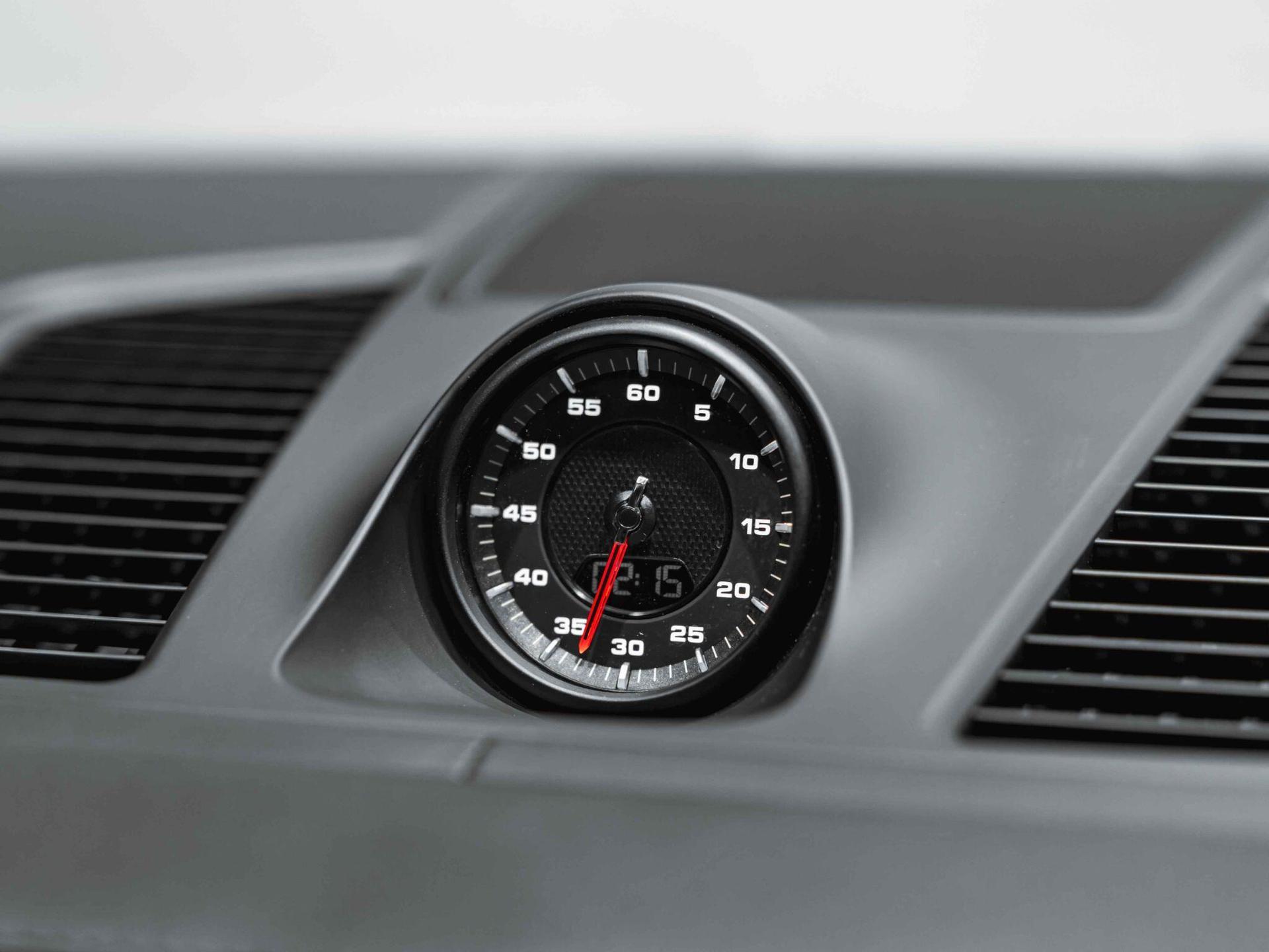 An interior shot of the driver instruments on a 2019 Porsche Cayenne