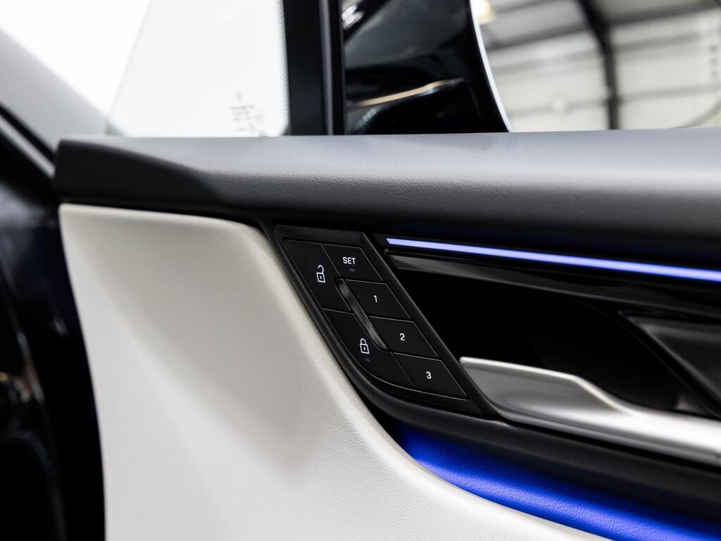 An interior shot of the misc controls on a 2025 Porsche Macan