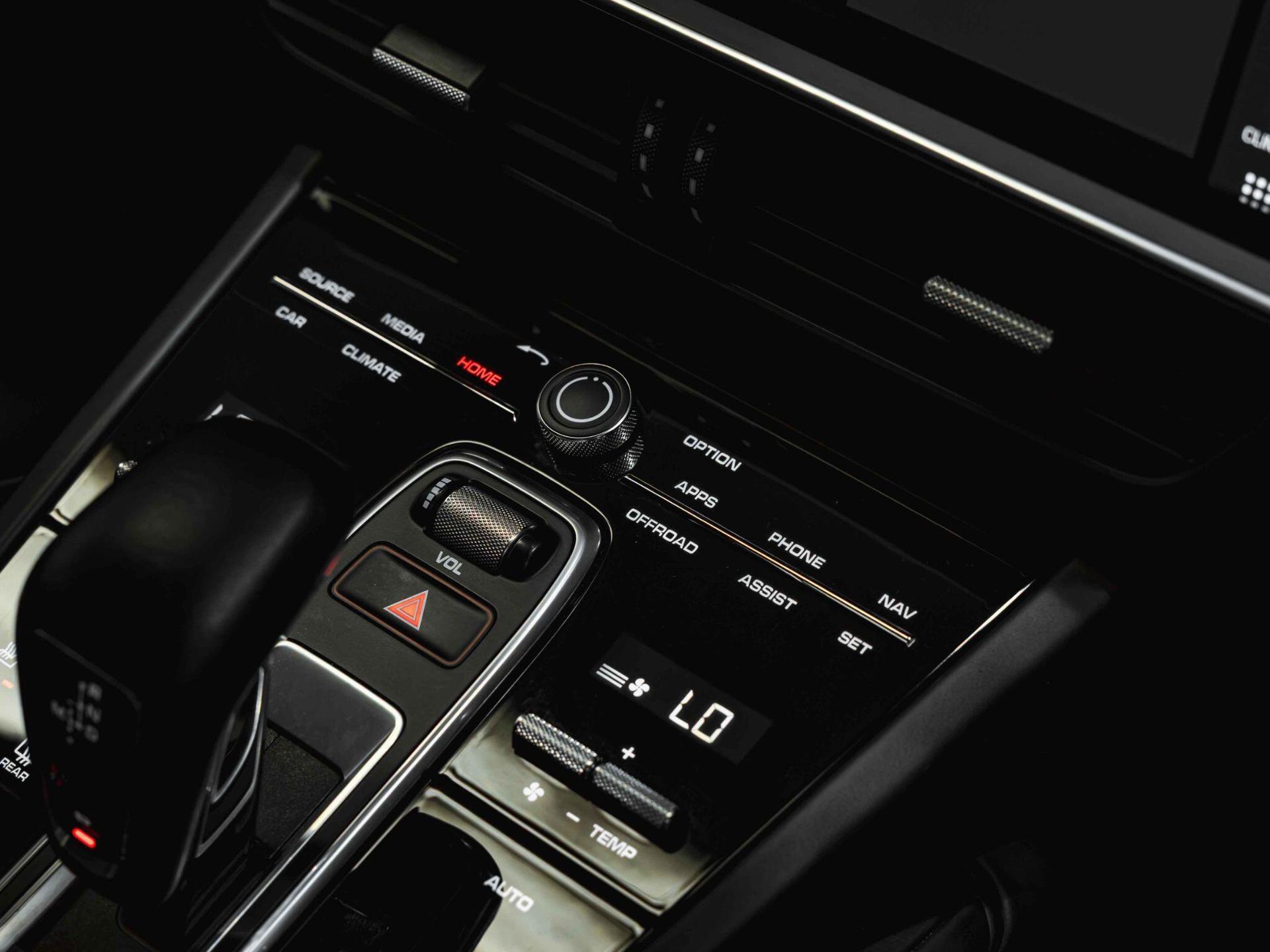 An interior shot of the misc controls on a 2019 Porsche Cayenne