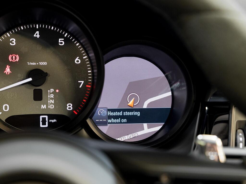 An interior shot of the driver instruments on a 2025 Porsche Macan