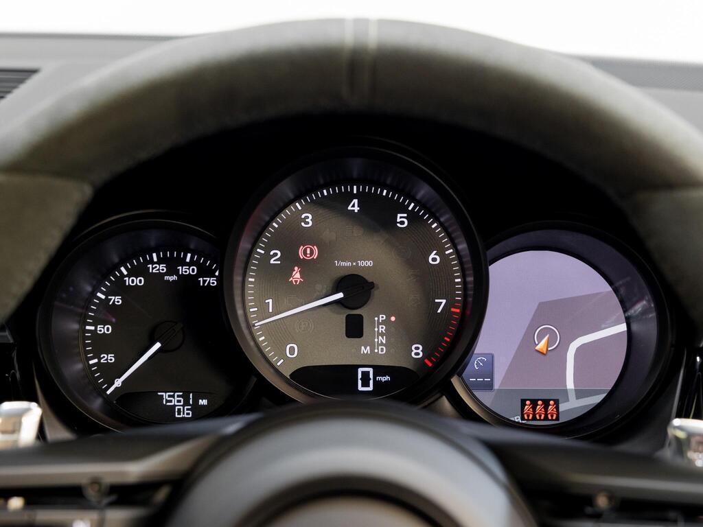 An interior shot of the driver instruments on a 2025 Porsche Macan