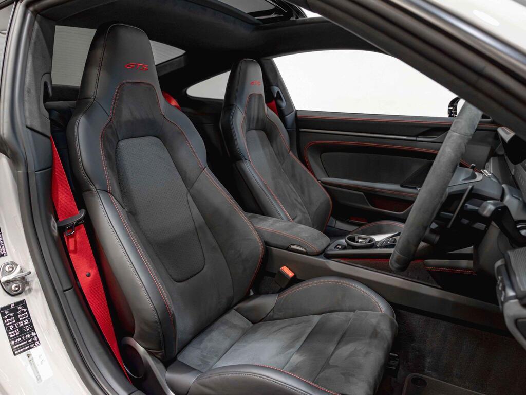 An interior shot of the driver seat on a 2026 Porsche 911
