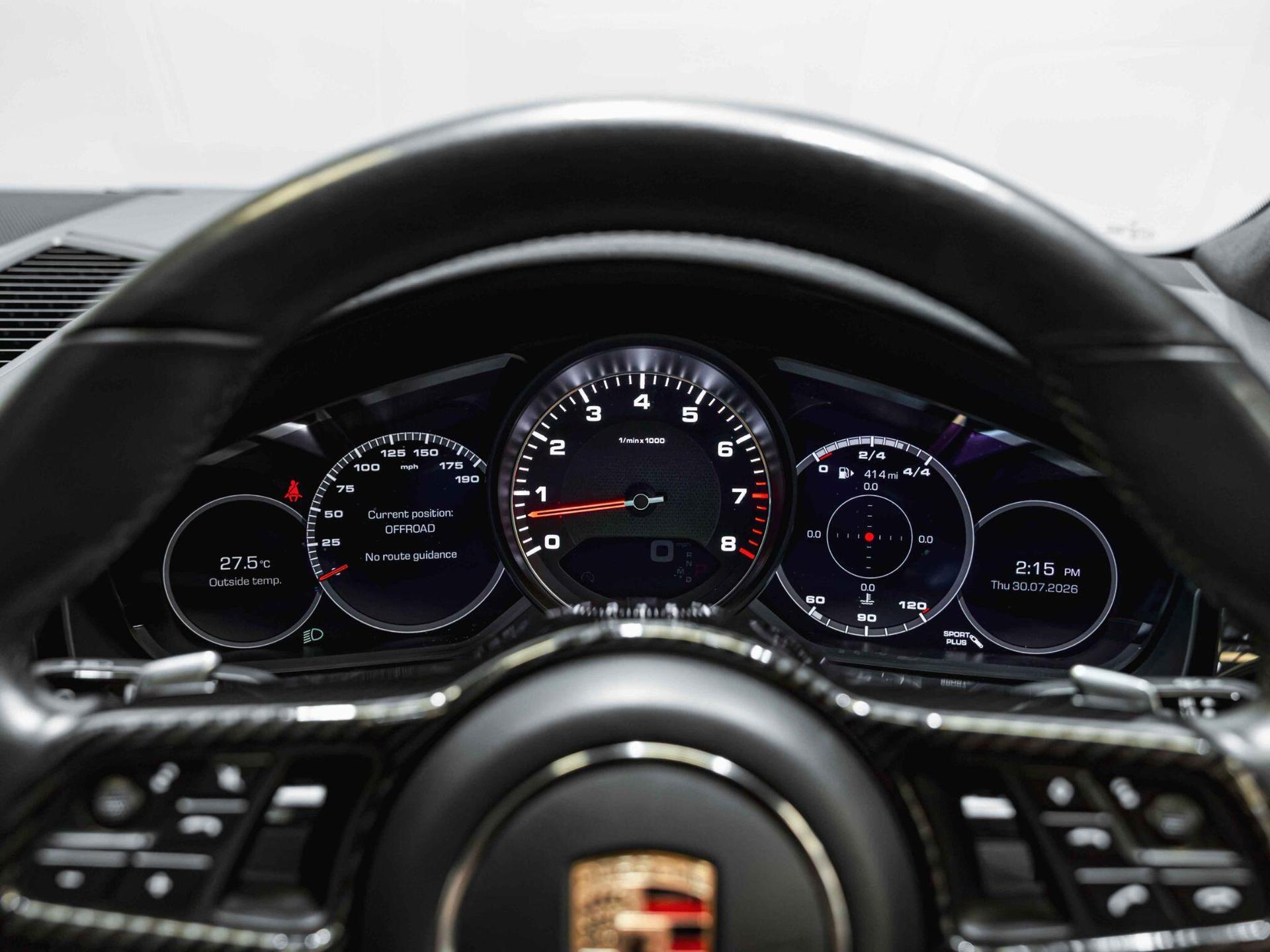 An interior shot of the driver instruments on a 2019 Porsche Cayenne