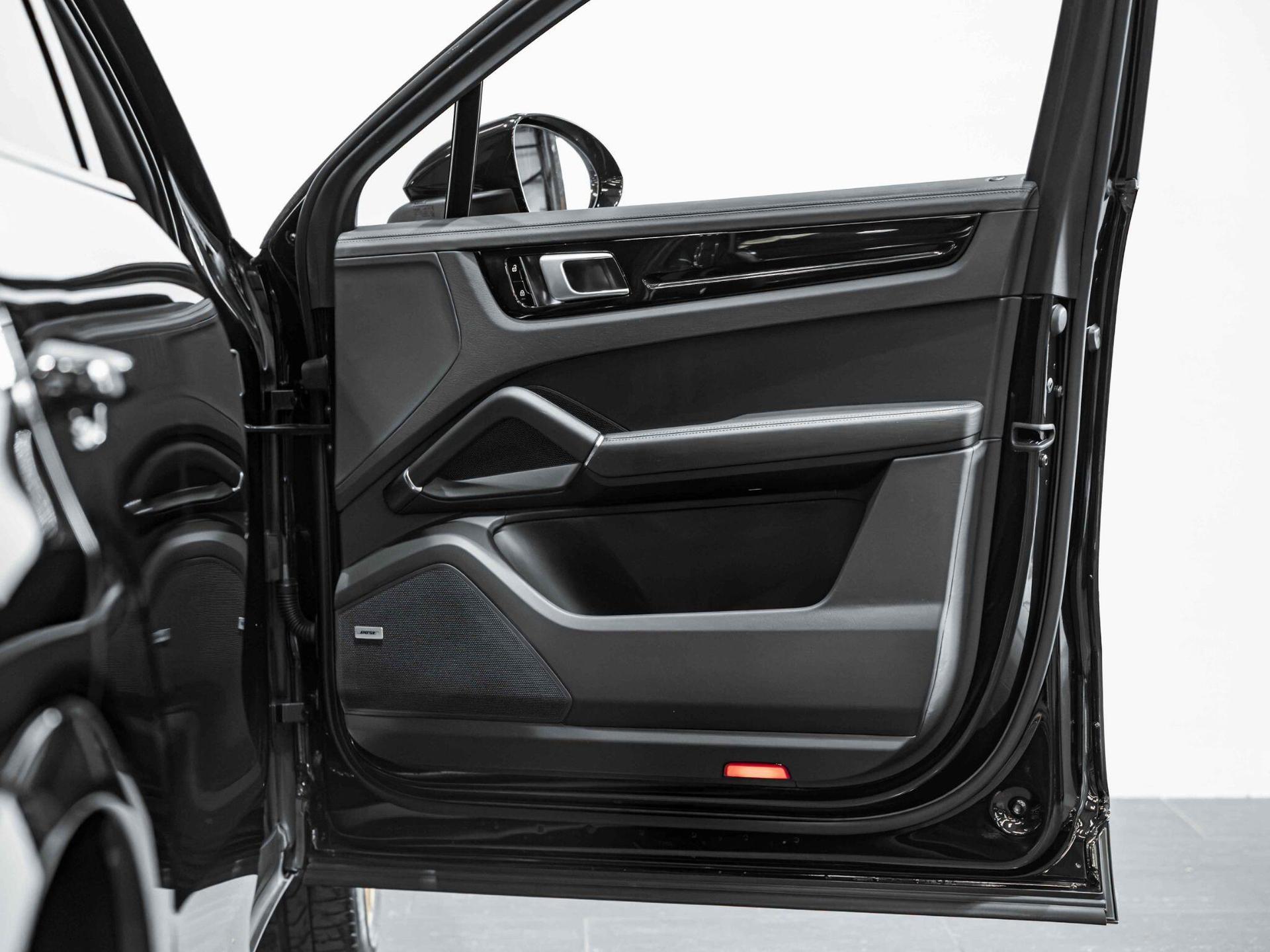 An interior shot of the door interior on a 2019 Porsche Cayenne