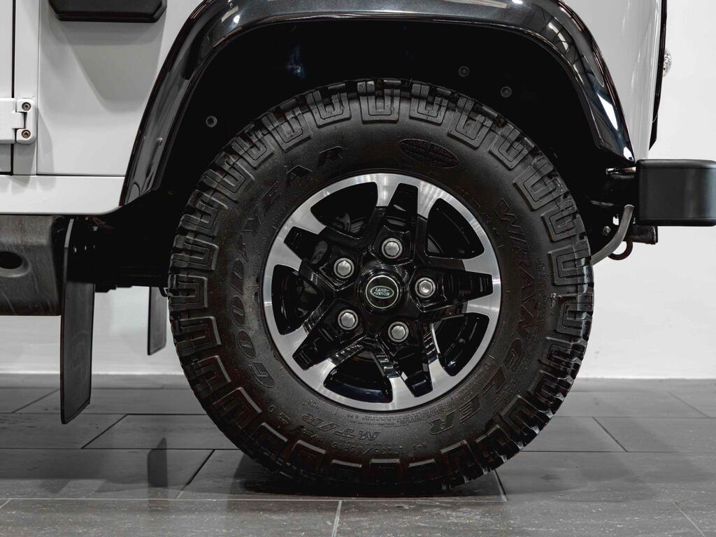 An exterior shot of the wheel on a 2016 Land Rover Defender 90
