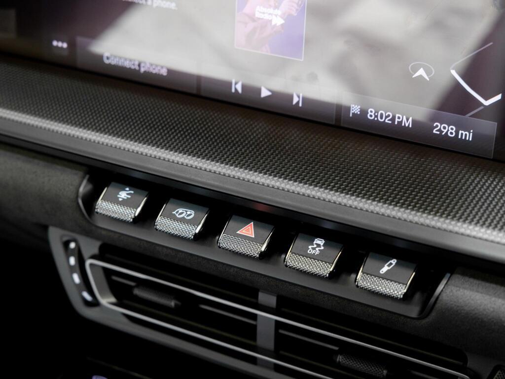 An interior shot of the misc controls on a 2023 Porsche 911