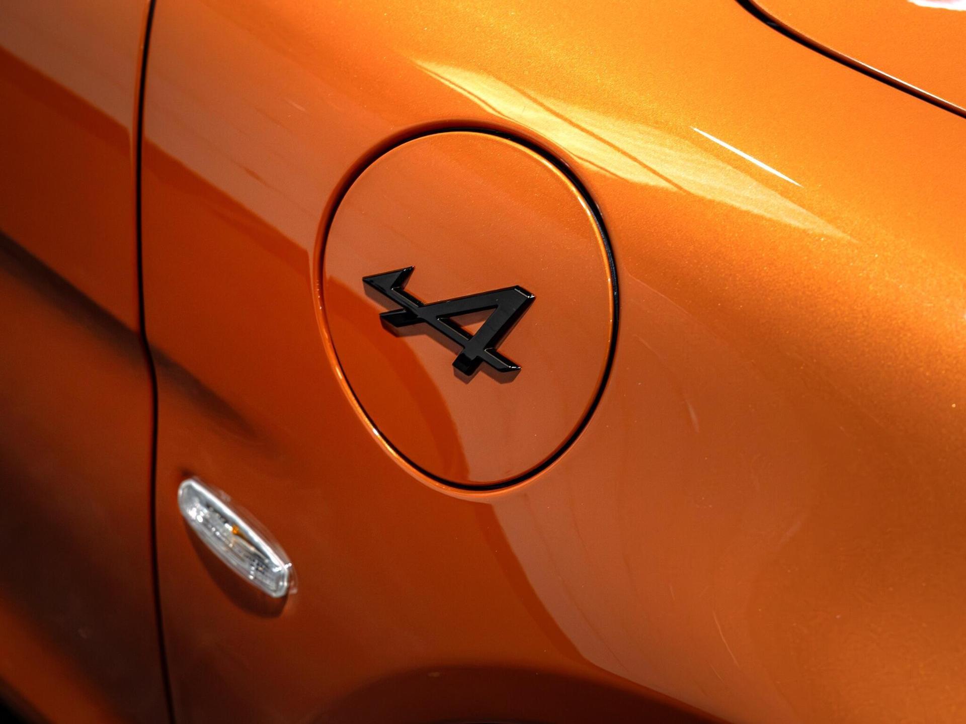 An exterior shot of the badge exterior on a 2026 Alpine A110