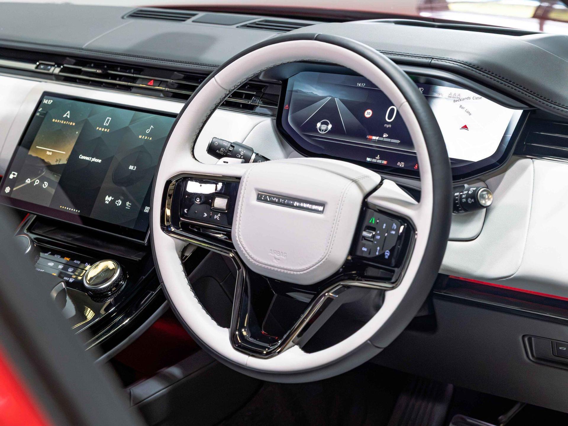 An interior shot of the steering wheel on a 2023 Land Rover Range Rover Sport