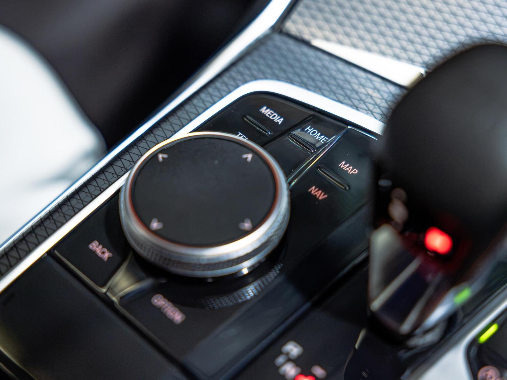 An interior shot of the misc controls on a 2025 BMW M4
