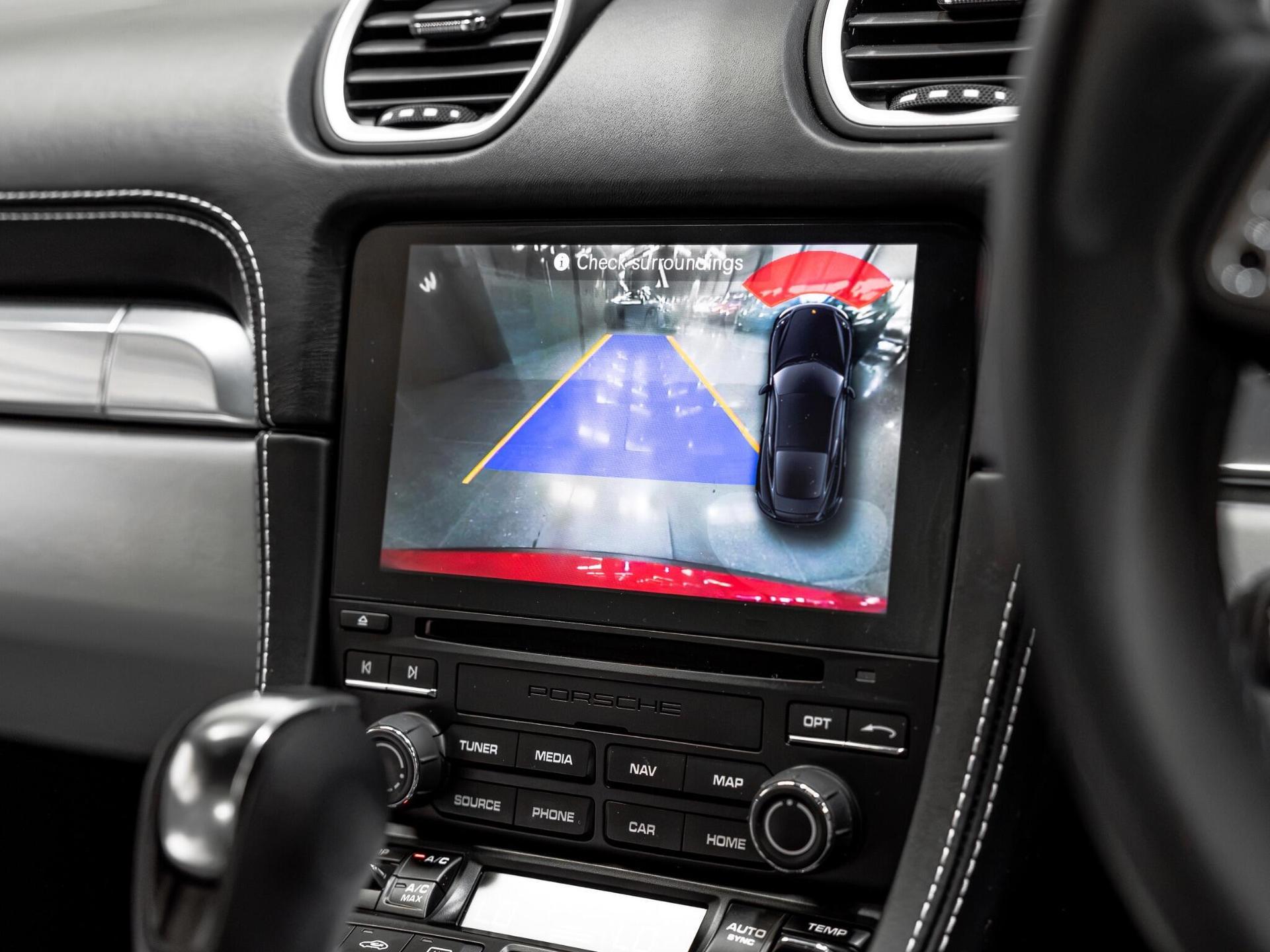 An interior shot of the infotainment system on a 2021 Porsche 718 Cayman