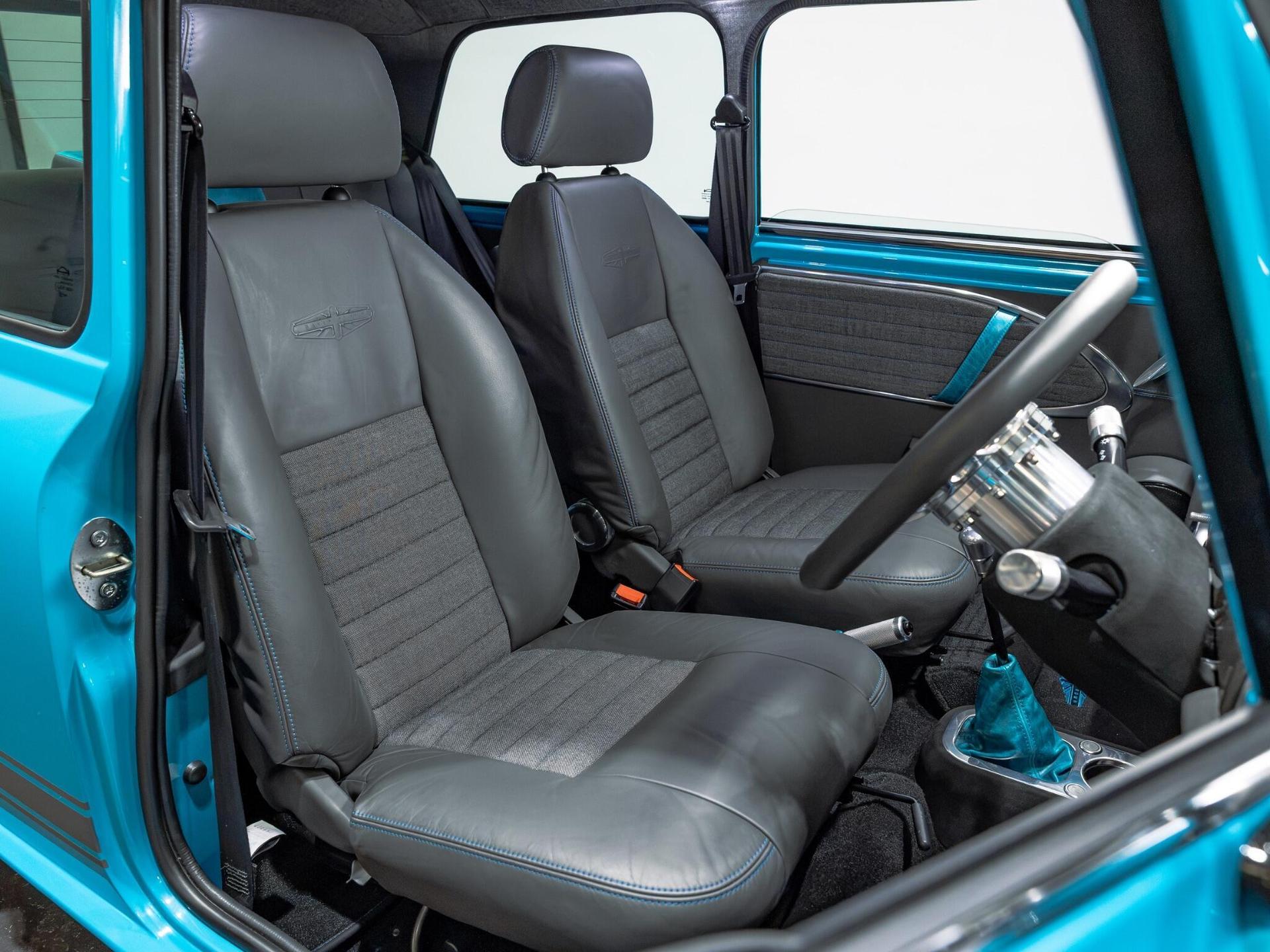 An interior shot of the driver seat on a 1997 Rover Mini