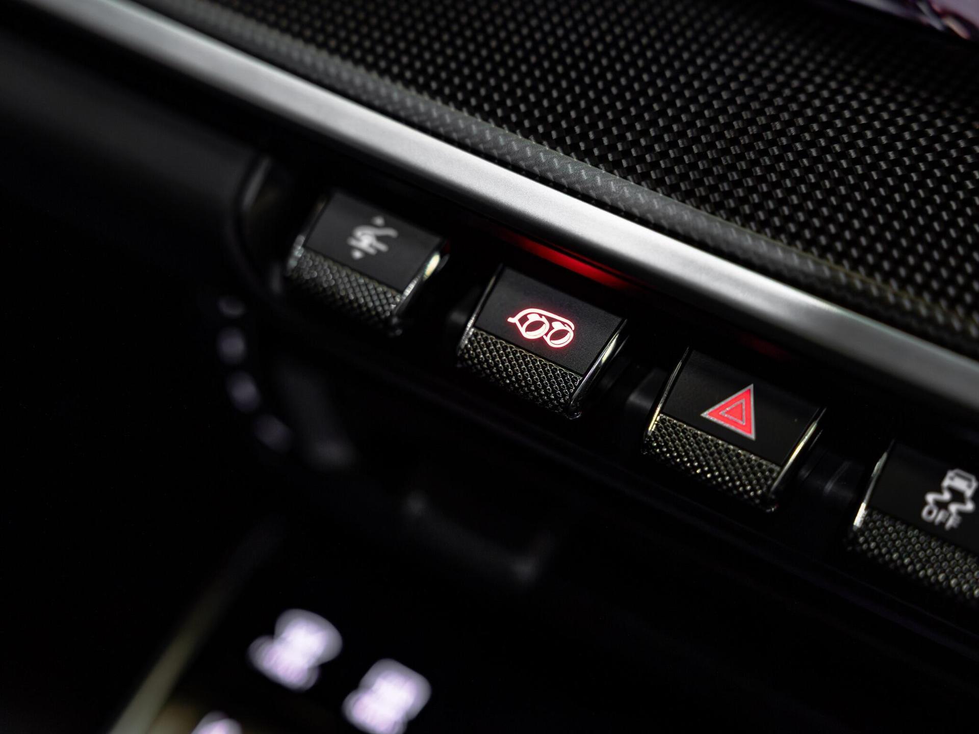 An interior shot of the misc controls on a 2022 Porsche 911
