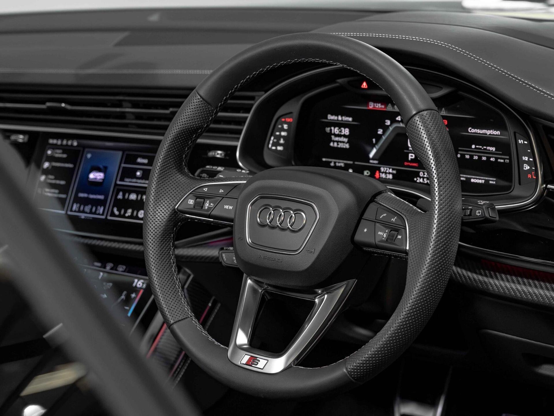 An interior shot of the steering wheel on a 2024 Audi SQ8