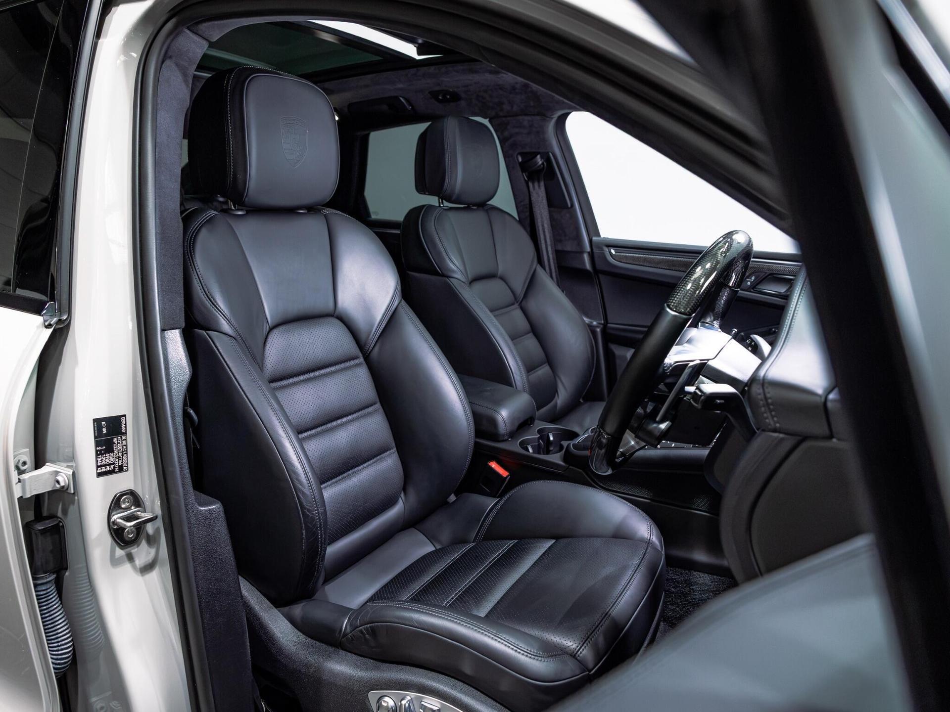 An interior shot of the driver seat on a 2020 Porsche Macan