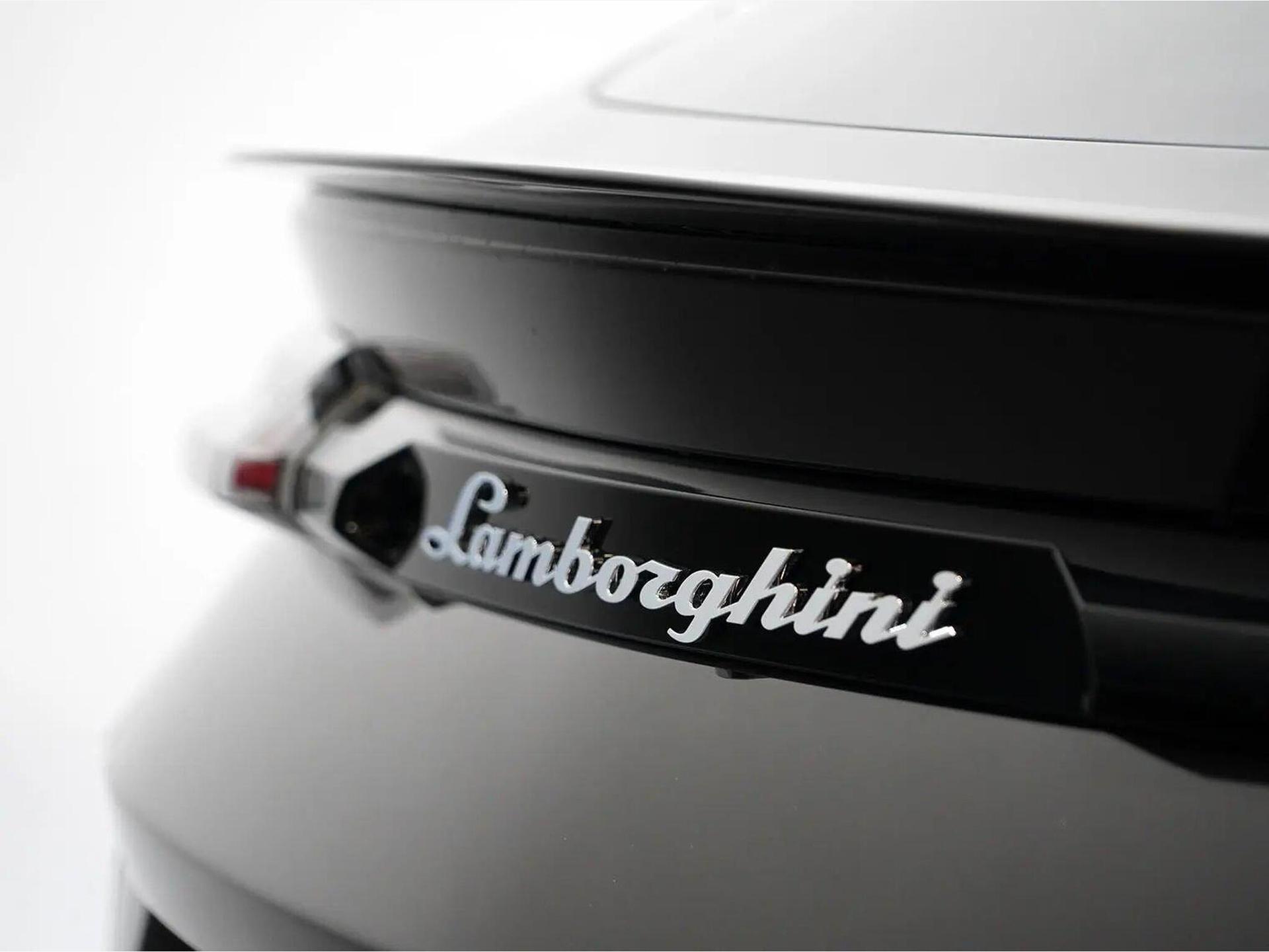An exterior shot of the badge exterior on a 2023 Lamborghini Urus