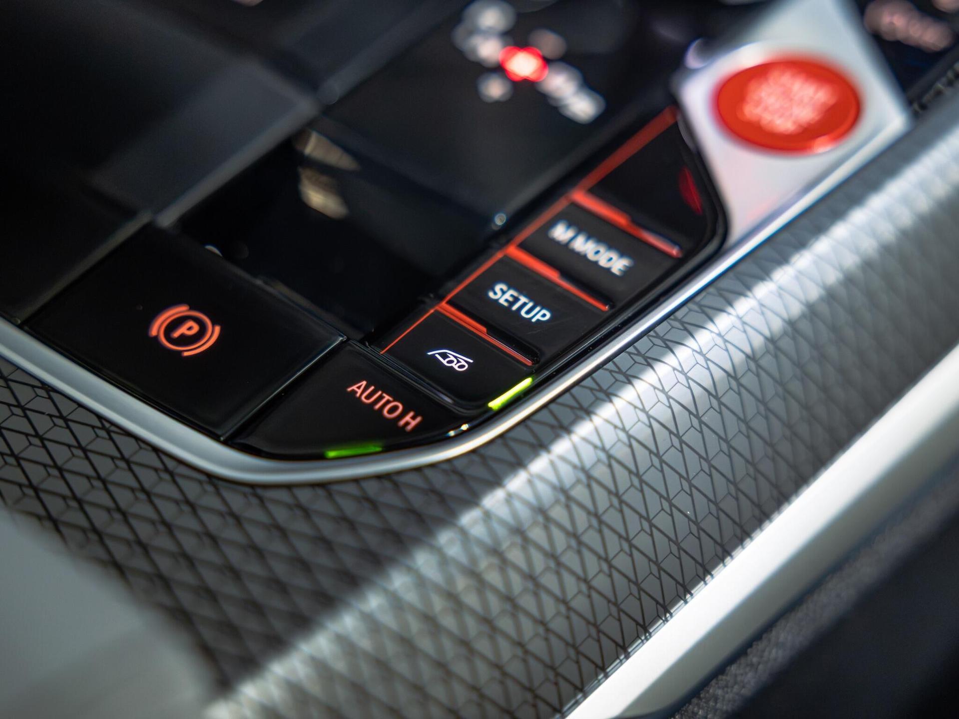 An interior shot of the misc controls on a 2025 BMW M4