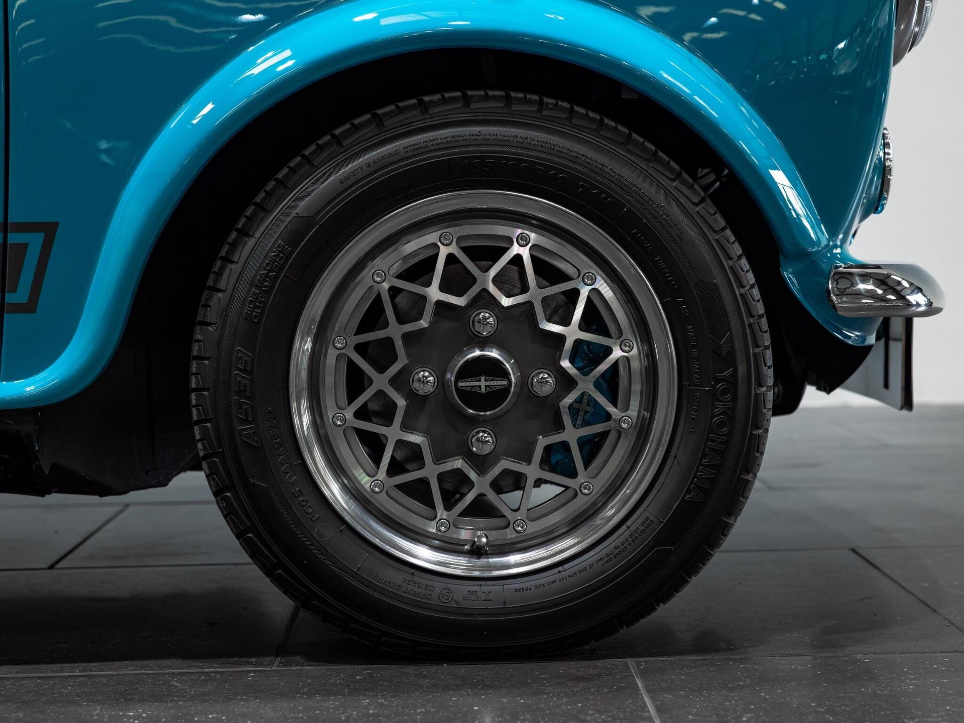 An exterior shot of the wheel on a 1997 Rover Mini