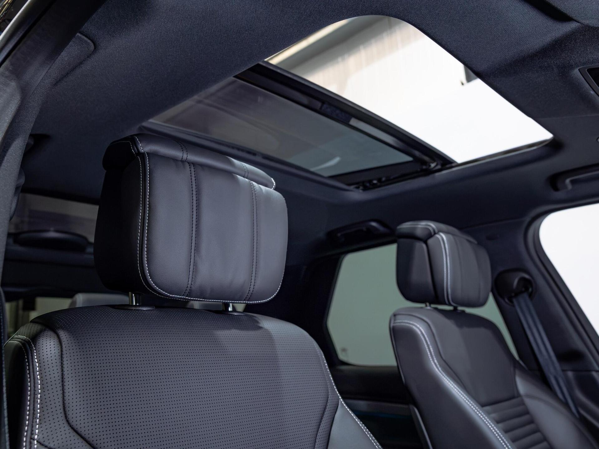 An interior shot of the driver seat on a 2026 Land Rover Discovery