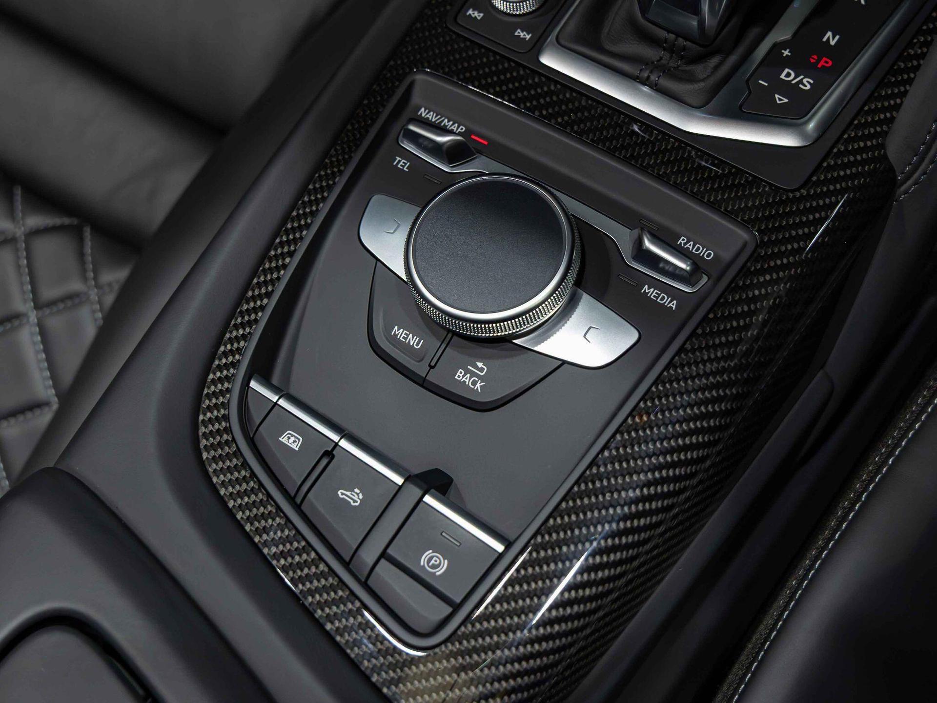 An interior shot of the misc controls on a 2021 Audi R8
