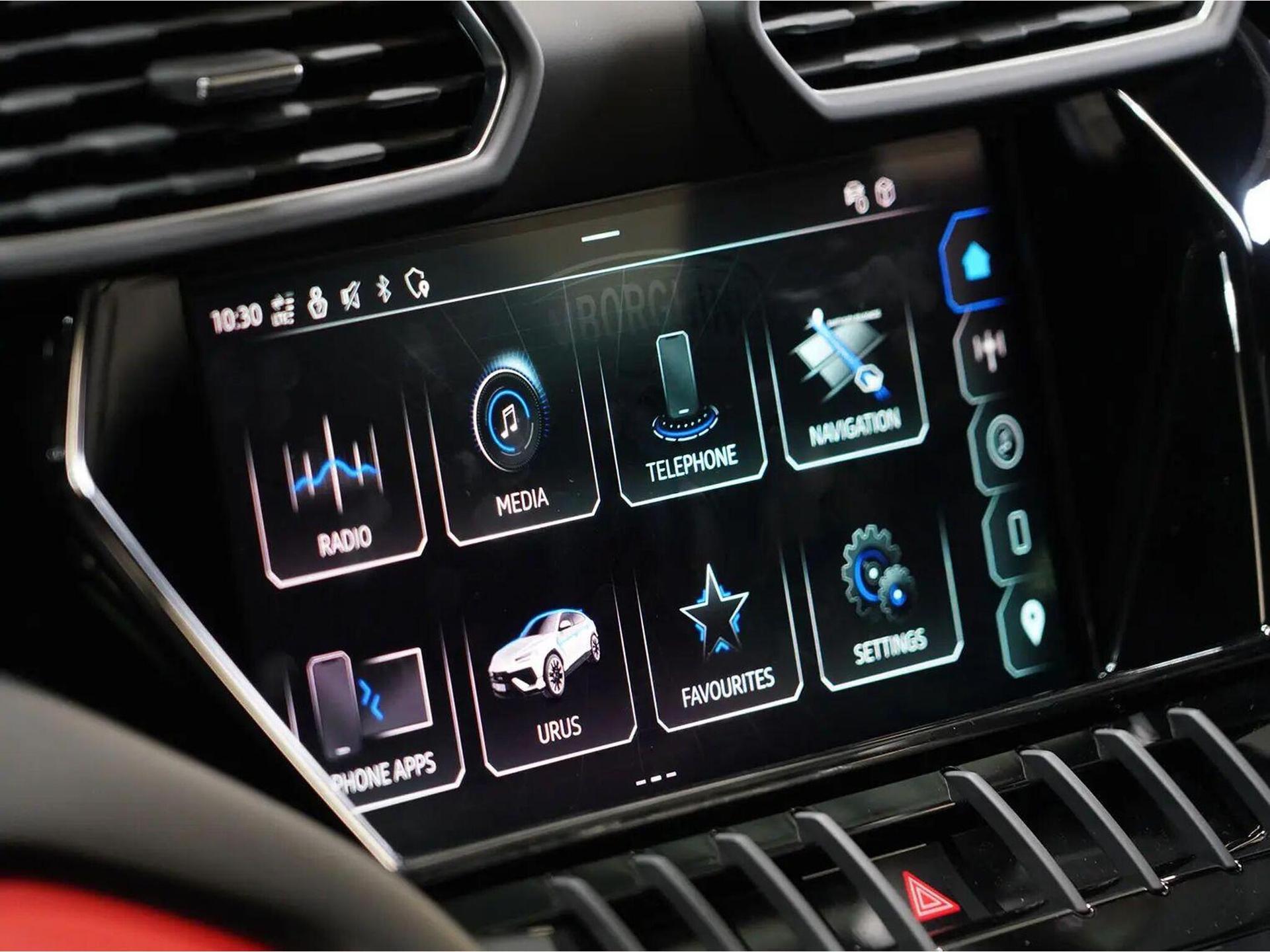 An interior shot of the infotainment system on a 2023 Lamborghini Urus