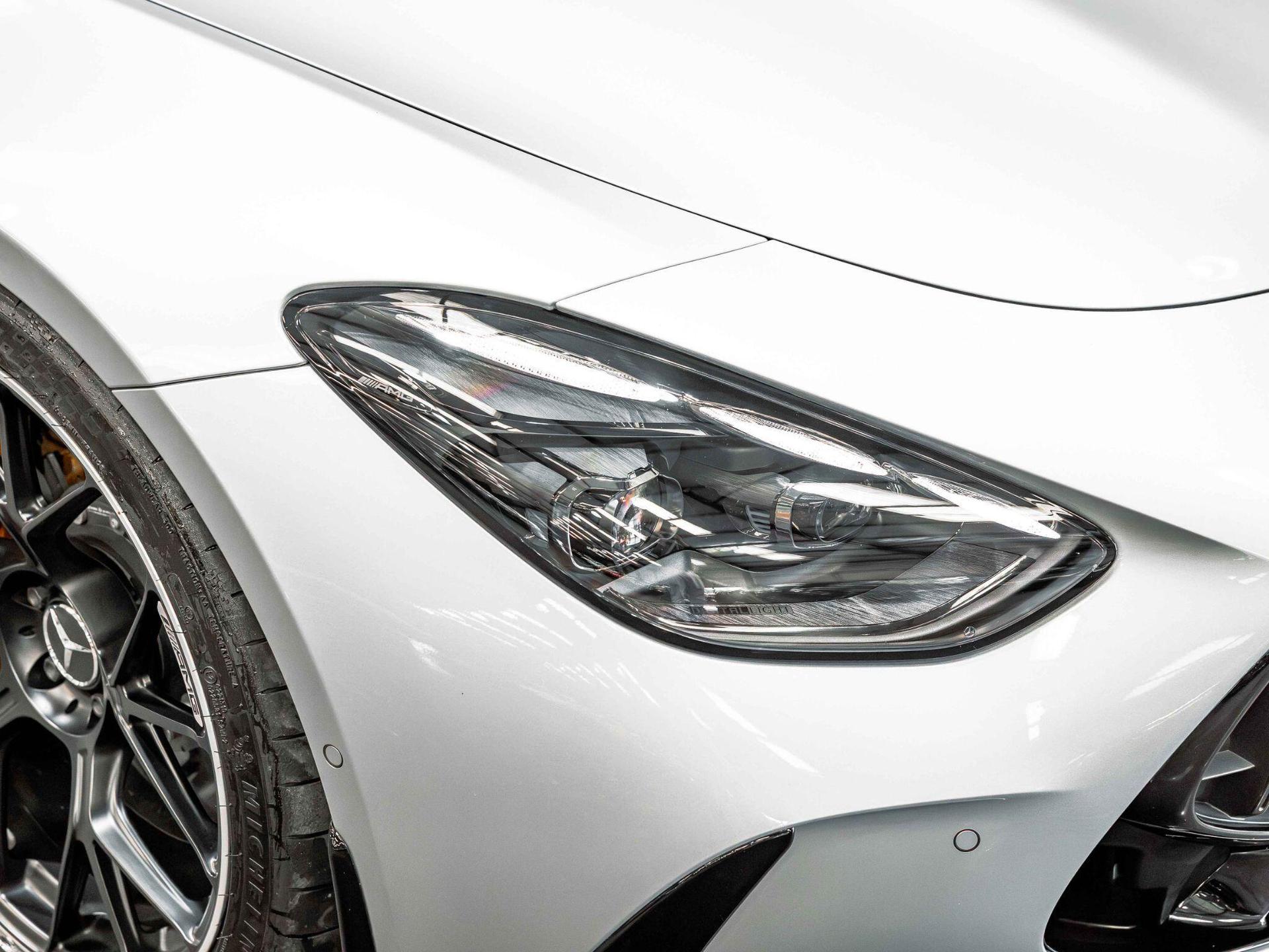 An exterior shot of the lights front on a 2024 Mercedes-Benz AMG GT