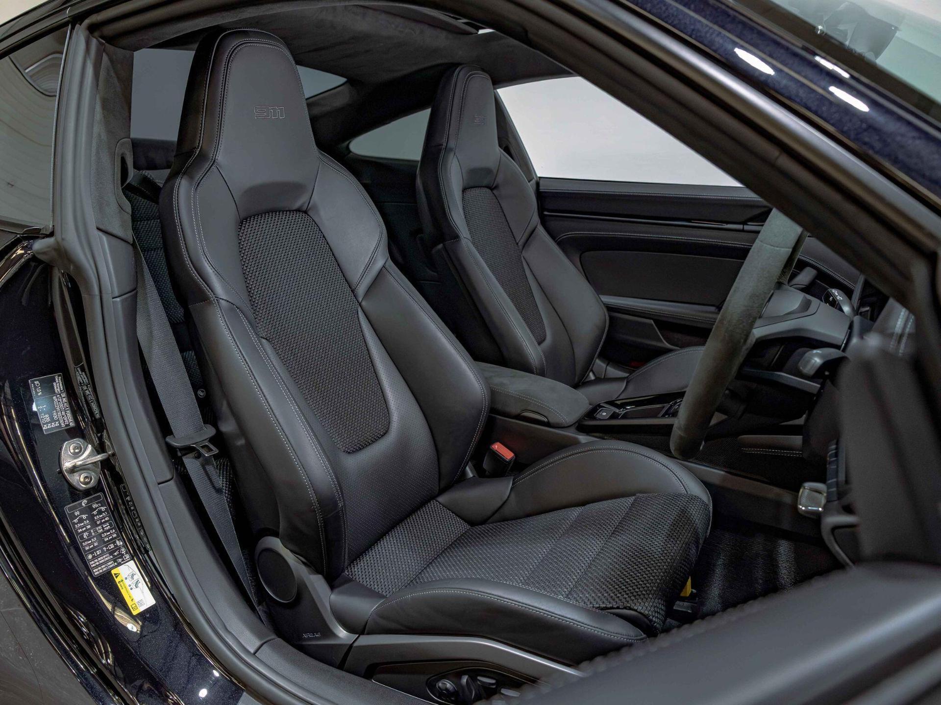 An interior shot of the driver seat on a 2024 Porsche 911